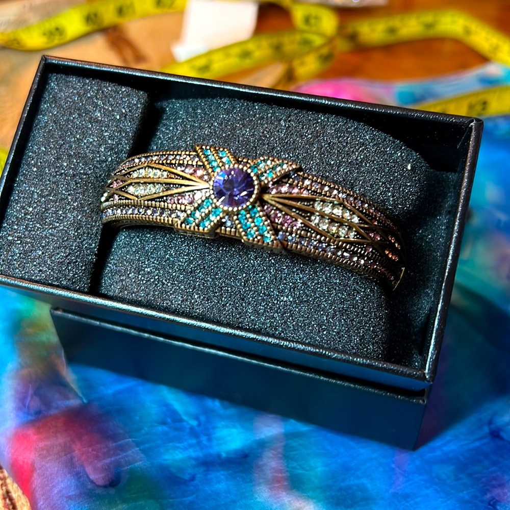 Heidi Daus purple and turquoise and rhinestones against old gold clamper signed